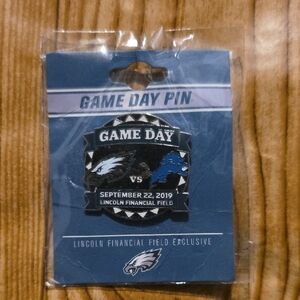 Eagles Vs Lions Game Day Pin - Black and Blue